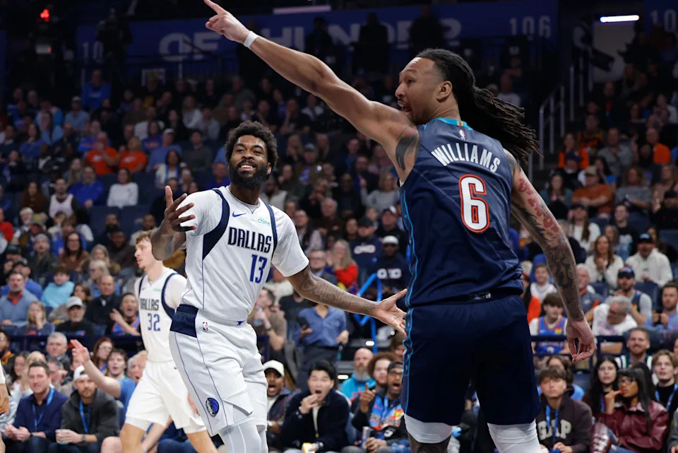 Dec 5, 2025; Oklahoma City, Oklahoma, USA; Dallas Mavericks forward Naji Marshall (13) and Oklahoma City Thunder forward Jaylin Williams (6) react after a play during the second quarter at Paycom Center. Mandatory Credit: Alonzo Adams-Imagn Images