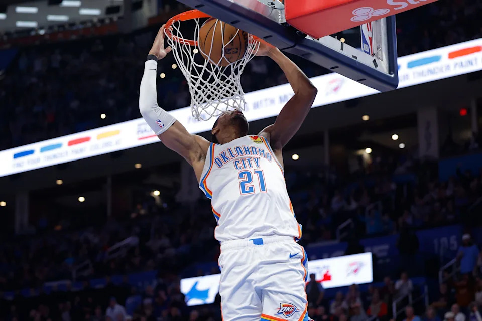 Dec 28, 2025; Oklahoma City, Oklahoma, USA; Oklahoma City Thunder guard Aaron Wiggins (21) dunks against the Philadelphia 76ers during the second half at Paycom Center. Mandatory Credit: Alonzo Adams-Imagn Images