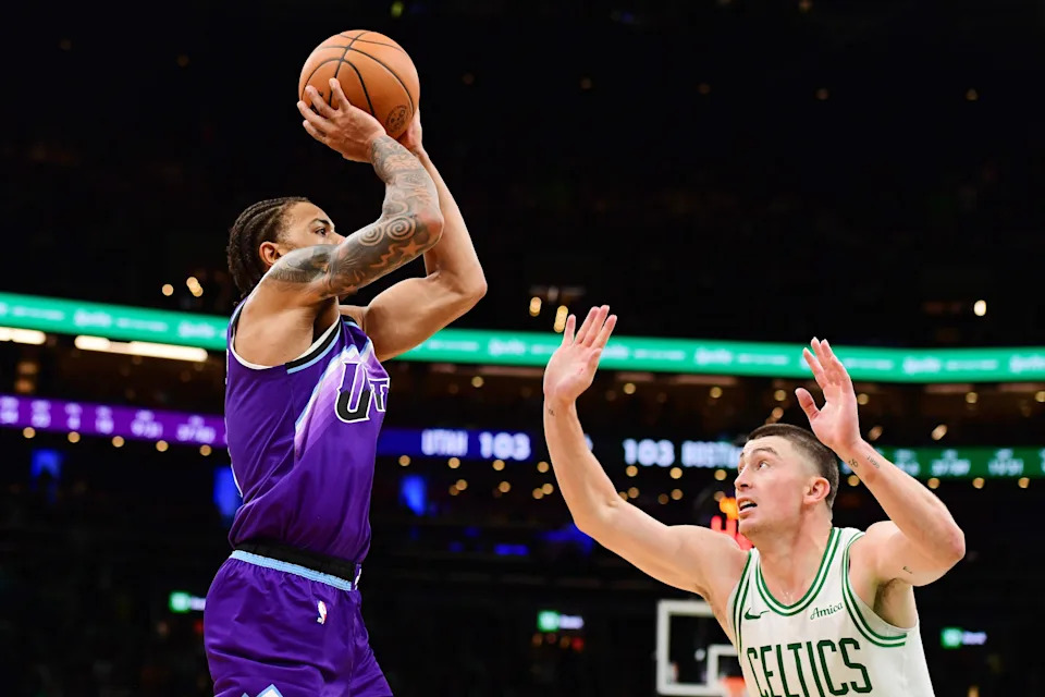 Nov 3, 2025; Boston, Massachusetts, USA; Utah Jazz guard Keyonte George (3) shoots the ball while Boston Celtics guard Payton Pritchard (11) defends during the second half at TD Garden. Mandatory Credit: Bob DeChiara-Imagn Images