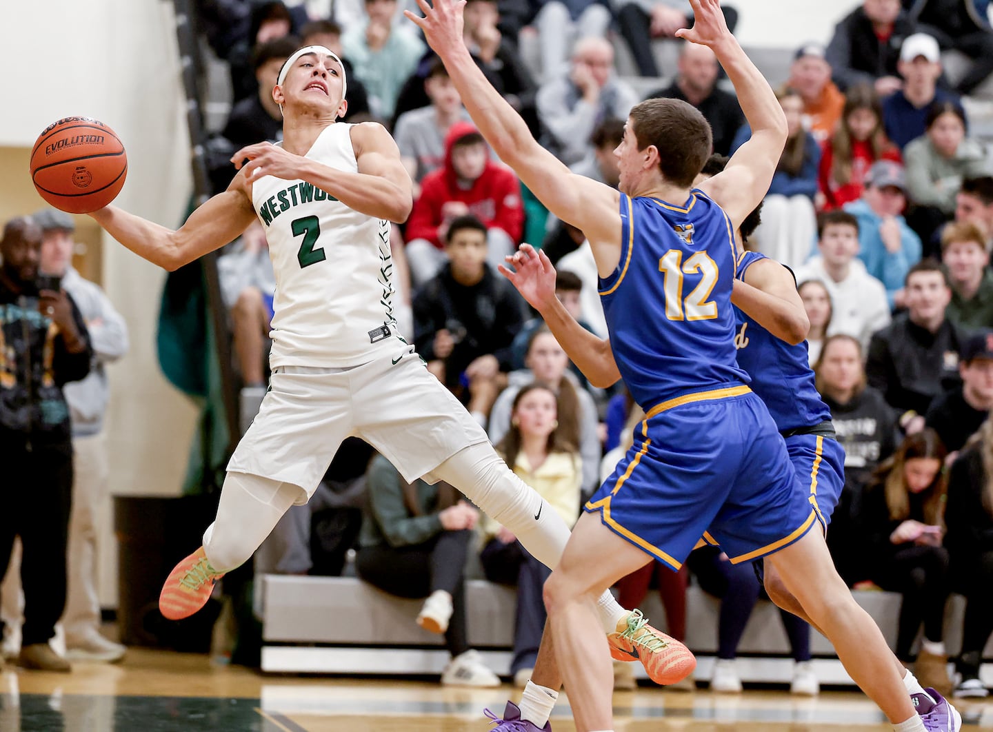 With a team-leading 60 points in a 3-0 start, Westwood's Robert Liriano-Alejandro (2) can score, but he was all in trying to keep the ball in play on a Wolverine possession.