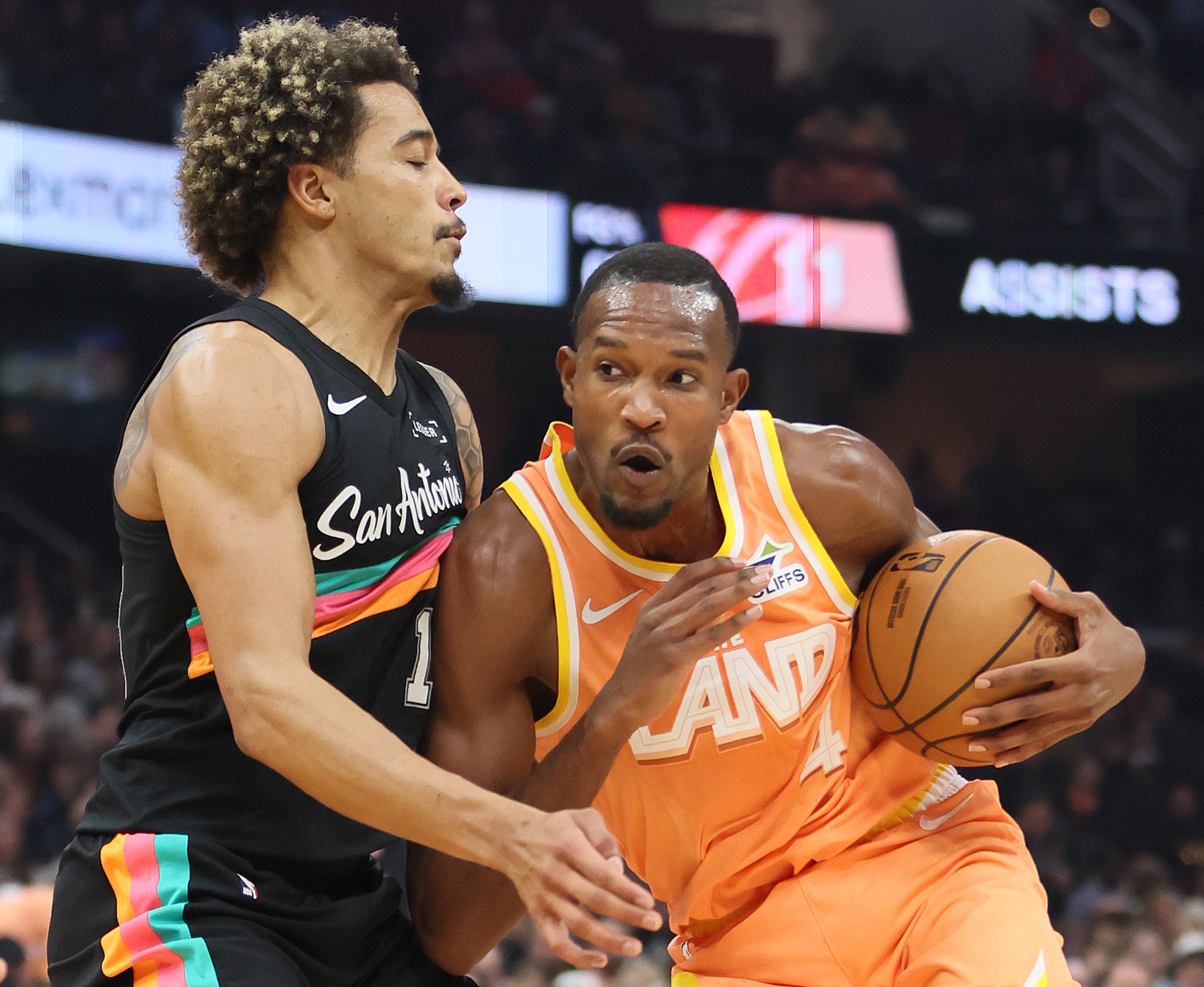 Cleveland Cavaliers center Evan Mobley drives towards the basket guarded by San Antonio Spurs forward Jeremy Sochan in the first half at Rocket Arena. 