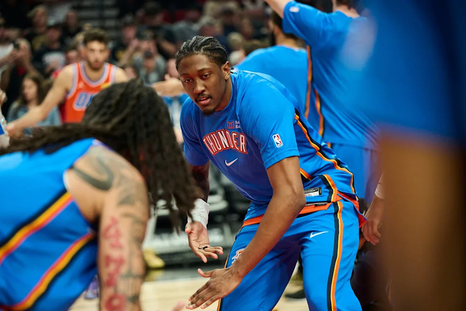 Nov 30, 2025; Portland, Oregon, USA; Oklahoma City Thunder guard Jalen Williams (8) greets teammates during introductions before a game against the Portland Trail Blazers at Moda Center. Mandatory Credit: Troy Wayrynen-Imagn Images