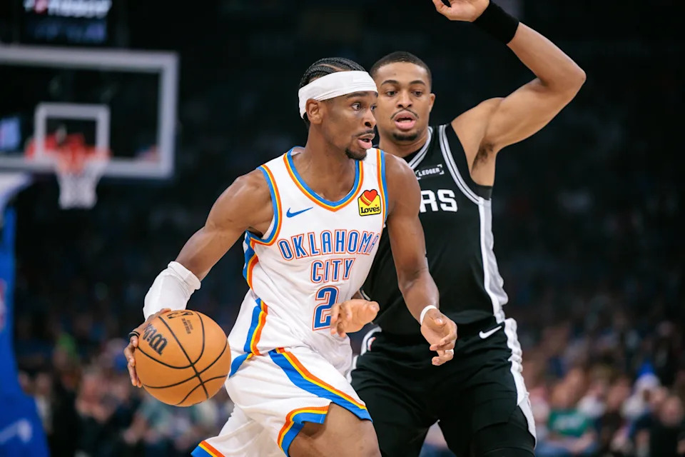 OKLAHOMA CITY, OKLAHOMA - DECEMBER 25: Shai Gilgeous-Alexander #2 of the Oklahoma City Thunder drives to the basket during the first half against the San Antonio Spurs at Paycom Center on December 25, 2025 in Oklahoma City, Oklahoma. NOTE TO USER: User expressly acknowledges and agrees that, by downloading and or using this photograph, User is consenting to the terms and conditions of the Getty Images License Agreement. (Photo by William Purnell/Getty Images)