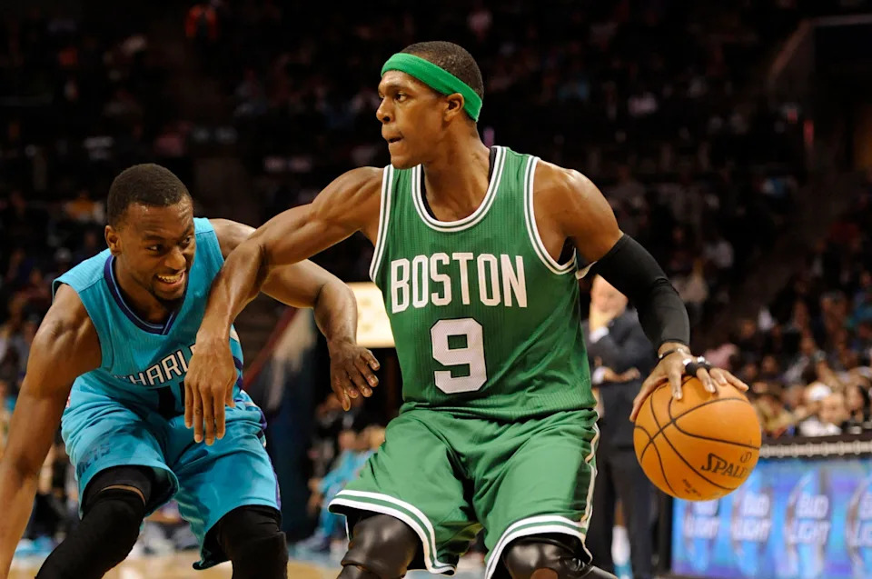 Dec 10, 2014; Charlotte, NC, USA; Boston Celtics guard Rajon Rondo (9) drives against Charlotte Hornets guard Kemba Walker (15) during the second half of the game at Time Warner Cable Arena. Hornets win 96-87. Mandatory Credit: Sam Sharpe-USA TODAY Sports