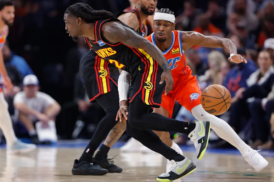 Dec 29, 2025; Oklahoma City, Oklahoma, USA; Oklahoma City Thunder guard Shai Gilgeous-Alexander (2) forces Atlanta Hawks guard Keaton Wallace (2) to turn over the ball during the second half at Paycom Center. Mandatory Credit: Alonzo Adams-Imagn Images