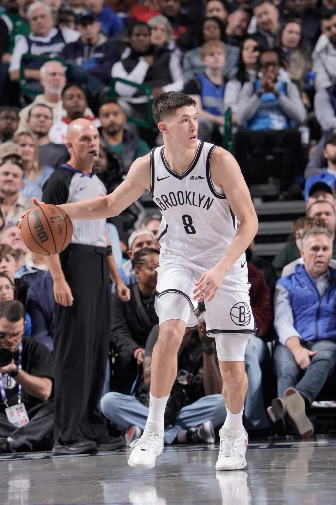 Egor Demin of the Brooklyn Nets dribbles the ball during the game against the Dallas Mavericks on December 12, 2025 at American Airlines Center in Dallas, Texas. NBAE via Getty Images