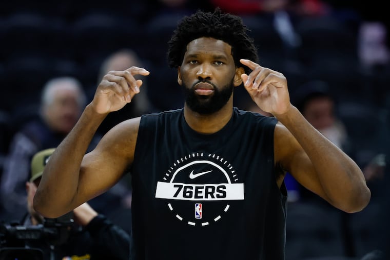 Sixers center Joel Embiid prepares to warm up before the Sixers play the Atlanta Hawks on Sunday, November 30, 2025 in Philadelphia.