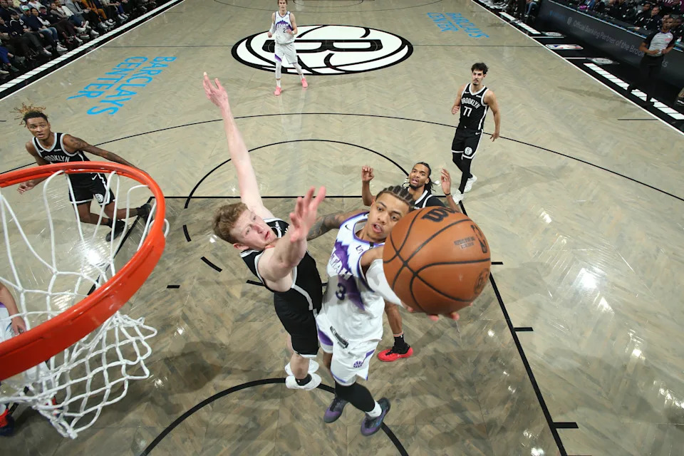 BROOKLYN, NY – DECEMBER 4: Keyonte George #3 of the Utah Jazz drives to the basket as Danny Wolf #2 of the Brooklyn Nets plays defense during the game on December 4, 2025 at Barclays Center in Brooklyn, New York. NOTE TO USER: User expressly acknowledges and agrees that, by downloading and or using this Photograph, user is consenting to the terms and conditions of the Getty Images License Agreement. Mandatory Copyright Notice: Copyright 2025 NBAE (Photo by Nathaniel S. Butler/NBAE via Getty Images)