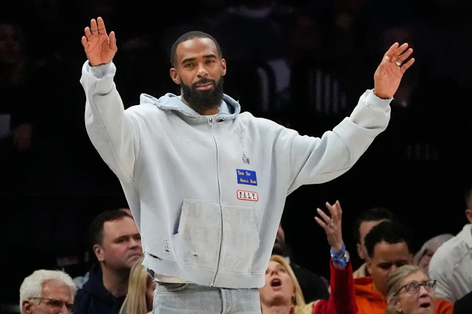 Dec 19, 2025; Minneapolis, Minnesota, USA; Minnesota Timberwolves guard Mike Conley (10) throws his arms up after a referee's call for the Oklahoma City Thunder in the fourth quarter at Target Center. Mandatory Credit: Bruce Kluckhohn-Imagn Images