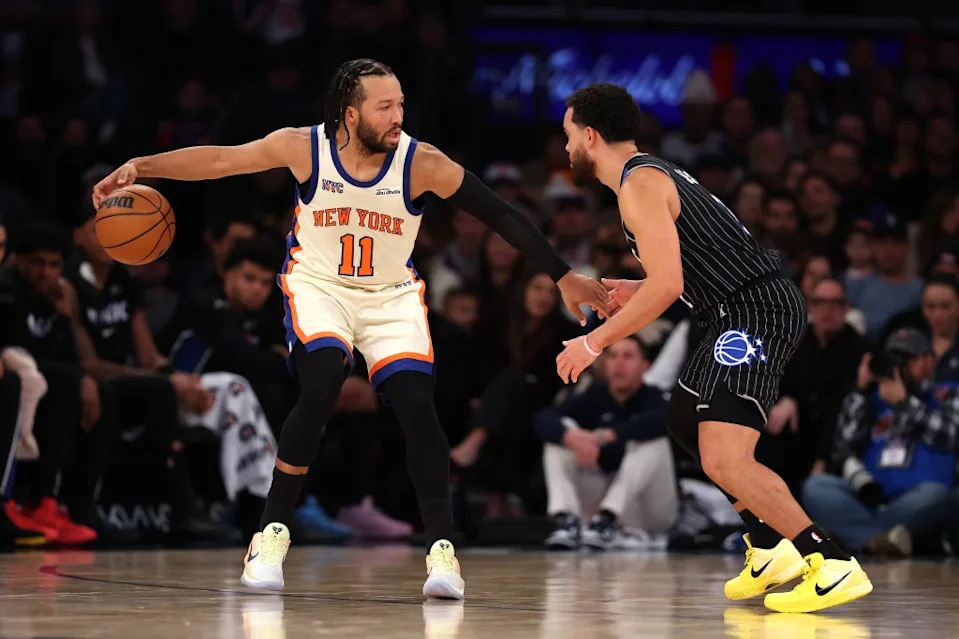 Jalen Brunson handles the ball against Tyus Jones of the Orlando Magic. Getty Images