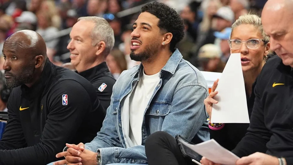 Indiana Pacers guard Tyrese Haliburton sitting courtside and rocking the Canadian tux. Trailblazing! - David Zalubowski/AP