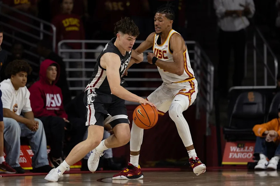 USC guard Chad Baker-Mazara (4) defends during a Big Ten Conference college basketball game against the Washington State Cougars, Sunday December 14, 2025 in Los Angeles, Calif.