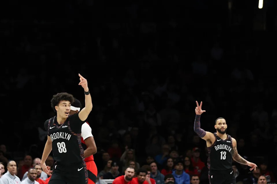 Nolan Traore (88) celebrates his 3-point shot during the first half of a game against the Toronto Raptors at the Barclays Center in Brooklyn, N.Y. Heather Khalifa for the NY Post