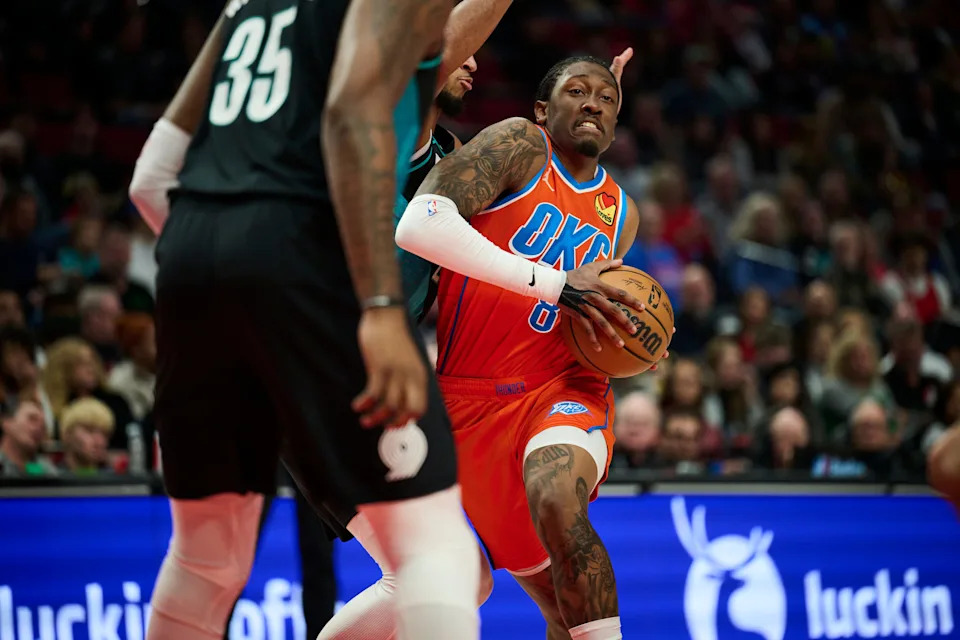 Nov 30, 2025; Portland, Oregon, USA; Oklahoma City Thunder guard Jalen Williams (8) drives to the basket during the first half against Portland Trail Blazers forward Kris Murray (24) at Moda Center. Mandatory Credit: Troy Wayrynen-Imagn Images