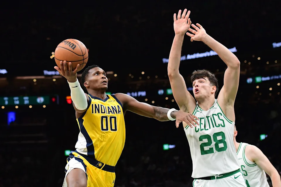 Dec 22, 2025; Boston, Massachusetts, USA; Indiana Pacers guard Bennedict Mathurin (00) drives to the basket while Boston Celtics guard Hugo Gonzalez (28) defends during the second half at TD Garden. Mandatory Credit: Bob DeChiara-Imagn Images