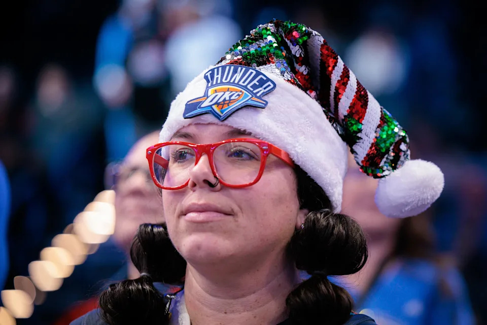 OKLAHOMA CITY, OKLAHOMA - DECEMBER 25: An Oklahoma City Thunder fan wears a Christmas hat prior to the game between the Oklahoma City Thunder and the San Antonio Spurs at Paycom Center on December 25, 2025 in Oklahoma City, Oklahoma. NOTE TO USER: User expressly acknowledges and agrees that, by downloading and or using this photograph, User is consenting to the terms and conditions of the Getty Images License Agreement. (Photo by William Purnell/Getty Images)