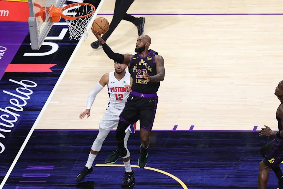 #23 SF LeBron James of the Los Angeles Lakers attempts a layup during an NBA game against the Detroit Pistons on December 30, 2025 in Los Angeles, CA.