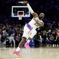 James and Doncic lead Lakers over Sixers, Thunder win 15th straight | National