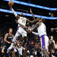 Lakers fend off Suns fightback, Hawks edge Sixers | National