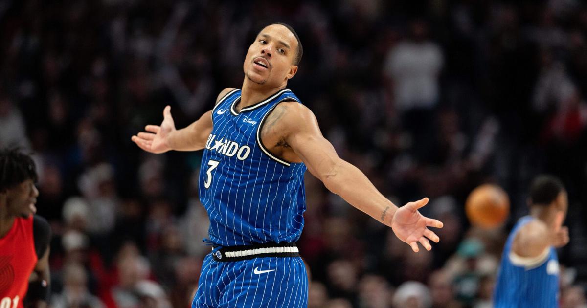 Bane's work on both ends helps Magic hold off Trail Blazers, 110-106 |