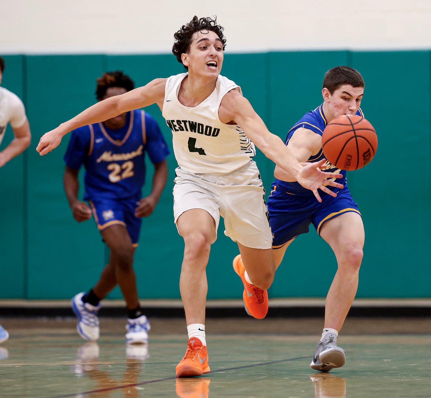 Westwood's Adrian Ortiz (left) and Norwood's Sam Larkee scrapped for a loose  ball in their Tri-Valley matchup.