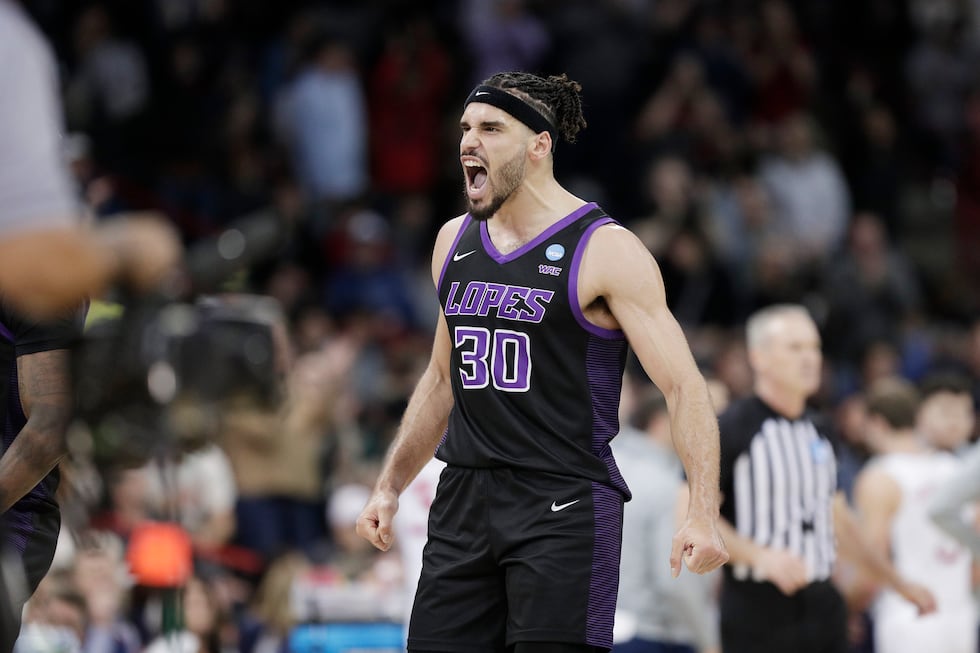 Grand Canyon forward Gabe McGlothan celebrates after a timeout was called during the second...