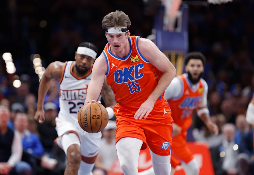 Dec 10, 2025; Oklahoma City, Oklahoma, USA; Oklahoma City Thunder center Branden Carlson (15) recovers a loose ball during a play against the Phoenix Suns during the second half at Paycom Center. Mandatory Credit: Alonzo Adams-Imagn Images