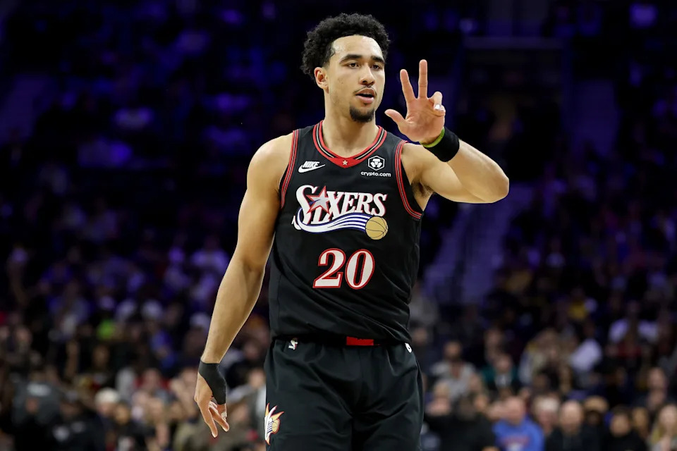 PHILADELPHIA, PENNSYLVANIA - DECEMBER 07: Jared McCain #20 of the Philadelphia 76ers celebrates a three-pointer during the first half against the Los Angeles Lakers at Xfinity Mobile Arena on December 07, 2025 in Philadelphia, Pennsylvania. NOTE TO USER: User expressly acknowledges and agrees that, by downloading and or using this photograph, User is consenting to the terms and conditions of the Getty Images License Agreement. (Photo by Emilee Chinn/Getty Images)
