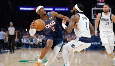 Oklahoma City Thunder guard Shai Gilgeous-Alexander moves the ball around Dallas Mavericks guard Jaden Hardy during the second half at Paycom Center.