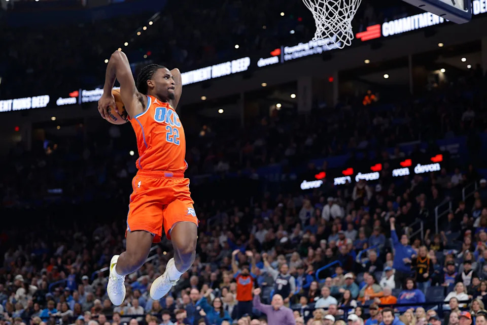 Dec 29, 2025; Oklahoma City, Oklahoma, USA; Oklahoma City Thunder guard Cason Wallace (22) goes up for a dunk against the Atlanta Hawks during the second half at Paycom Center. Mandatory Credit: Alonzo Adams-Imagn Images