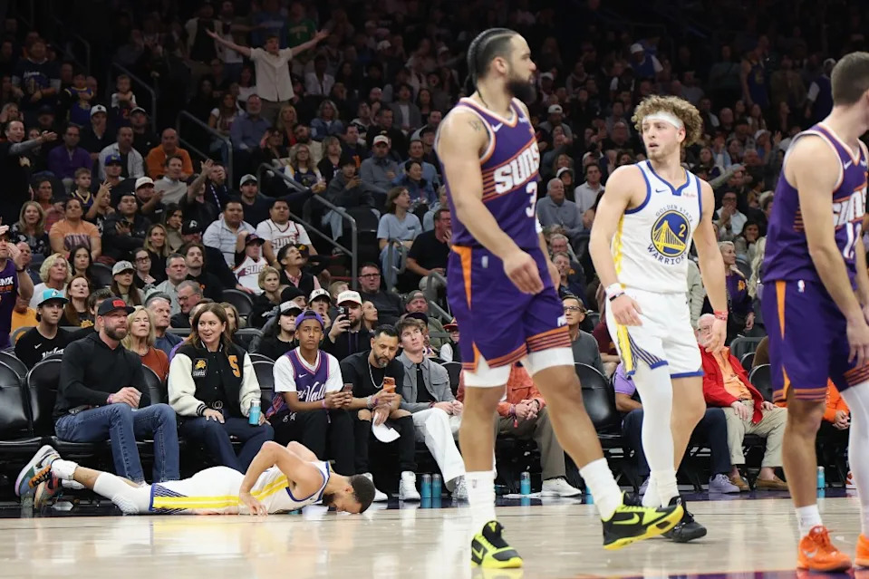 Stephen Curry reacts after a flagrant foul from Dillon Brooks of the Phoenix Suns. Getty Images