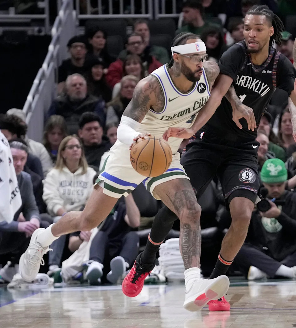 Milwaukee Bucks guard Gary Trent Jr. (5) is guarded by Brooklyn Nets forward Ziaire Williams (1) during the first half of their game Saturday, November 29, 2025 at Fiserv Forum in Milwaukee, Wisconsin.