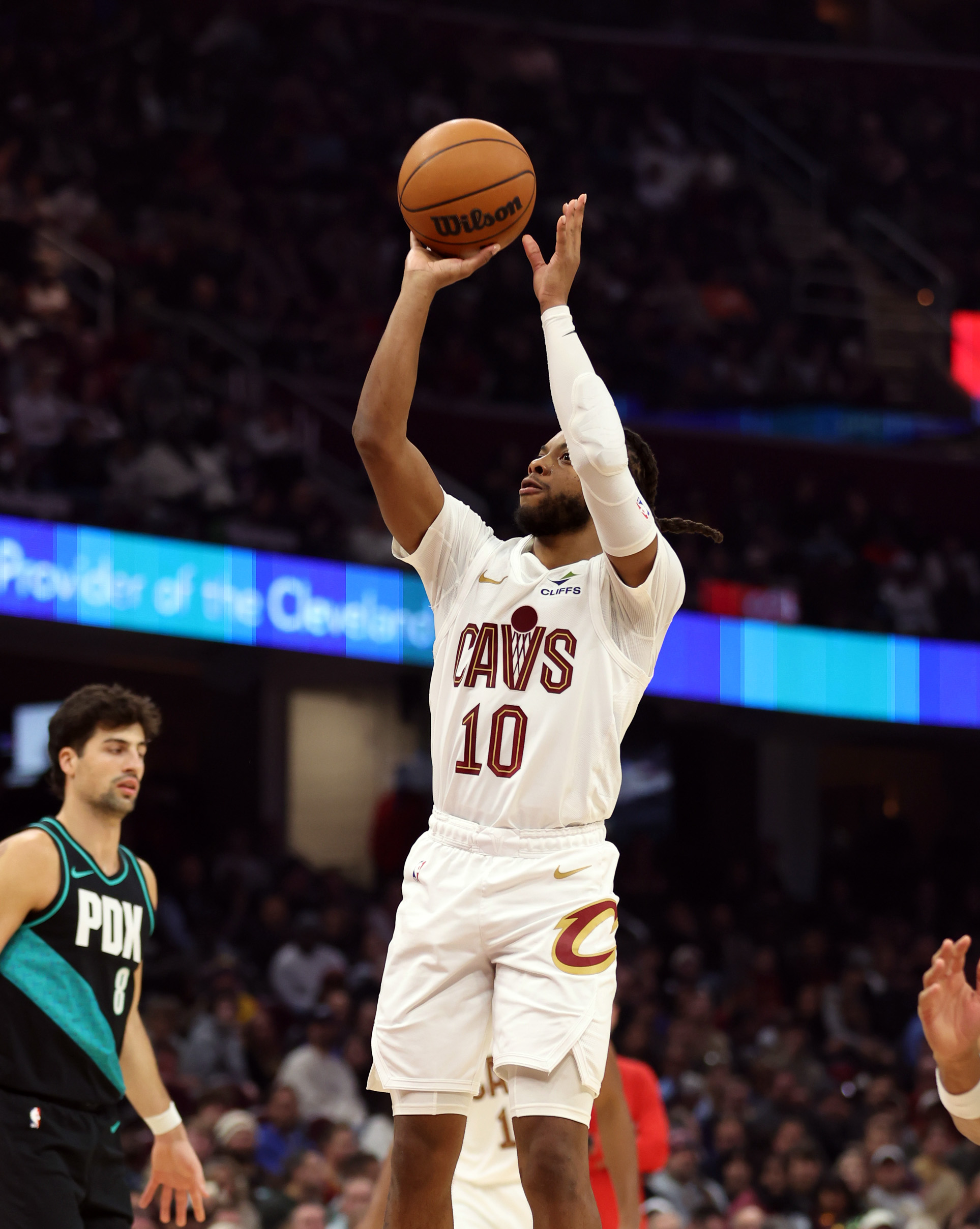 Cleveland Cavaliers guard Darius Garland shoots against the Portland Trail Blazers in the first half of play. 