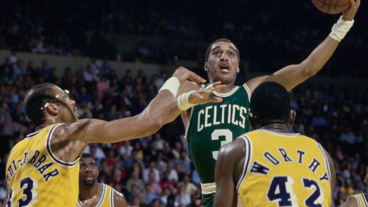 DJ jersey retired; Perkins debut; Claxton born