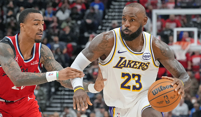 Los Angeles Lakers forward Lebron James (23) is defended by LA Clippers forward John Collins (20) in the second half at Intuit Dome.