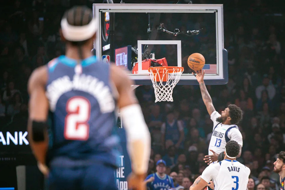 OKLAHOMA CITY, OKLAHOMA - DECEMBER 05: Naji Marshall #13 of the Dallas Mavericks shoots the ball during the first half against the Oklahoma City Thunder at Paycom Center on December 5, 2025 in Oklahoma City, Oklahoma. NOTE TO USER: User expressly acknowledges and agrees that, by downloading and or using this photograph, User is consenting to the terms and conditions of the Getty Images License Agreement. (Photo by William Purnell/Getty Images)
