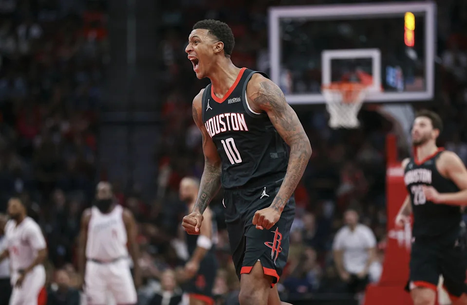 Nov 15, 2024; Houston, Texas, USA; Houston Rockets forward Jabari Smith Jr. (10) reacts after making a basket during the second quarter against the Los Angeles Clippers at Toyota Center. Mandatory Credit: Troy Taormina-Imagn Images