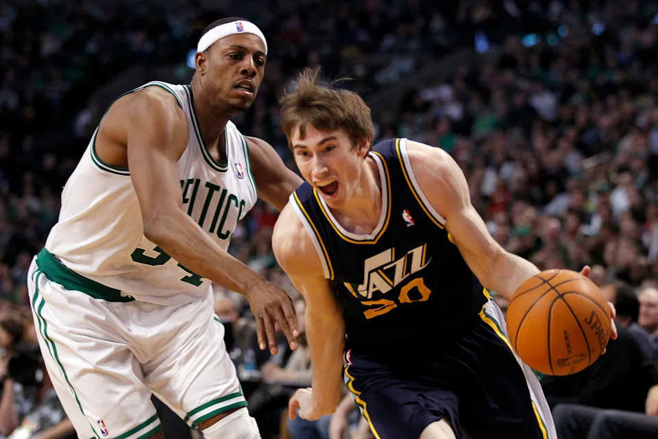 Jan 21, 2011; Boston, MA, USA; Utah Jazz forward Gordon Hayward (20) drives the ball during the first half past Boston Celtics forward Paul Pierce (34) the at the TD Garden. Mandatory Credit: David Butler II-USA TODAY Sports