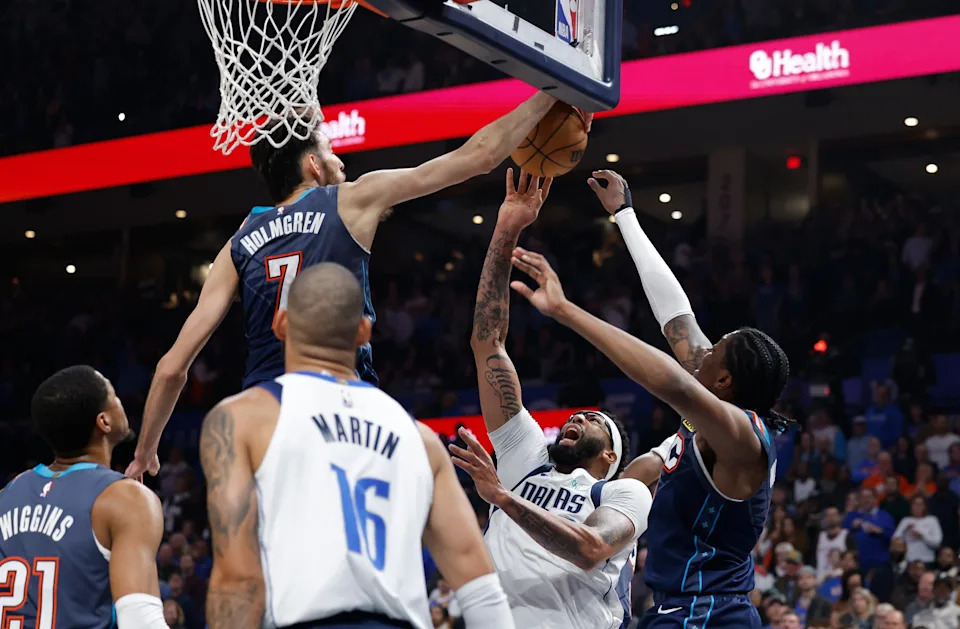 Dec 5, 2025; Oklahoma City, Oklahoma, USA; Oklahoma City Thunder center Chet Holmgren (7) blocks a shot by Dallas Mavericks forward Anthony Davis (3) during the second quarter at Paycom Center. Mandatory Credit: Alonzo Adams-Imagn Images