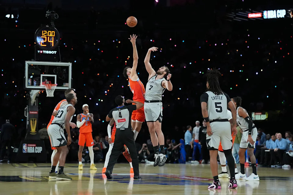 Dec 13, 2025; Las Vegas, Nevada, USA Oklahoma City Thunder center Chet Holmgren (7) and San Antonio Spurs center Luke Kornet (7) jump for the opening tip during the first quarter at T-Mobile Arena. Mandatory Credit: Kirby Lee-Imagn Images