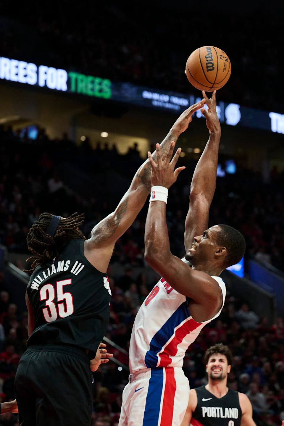 Detroit Pistons center Jalen Duren (0) shoots a basket during the second half against Portland Trail Blazers center Robert Williams III (35) at Moda Center in Portland, Oregon, on Monday, Dec. 22, 2025.