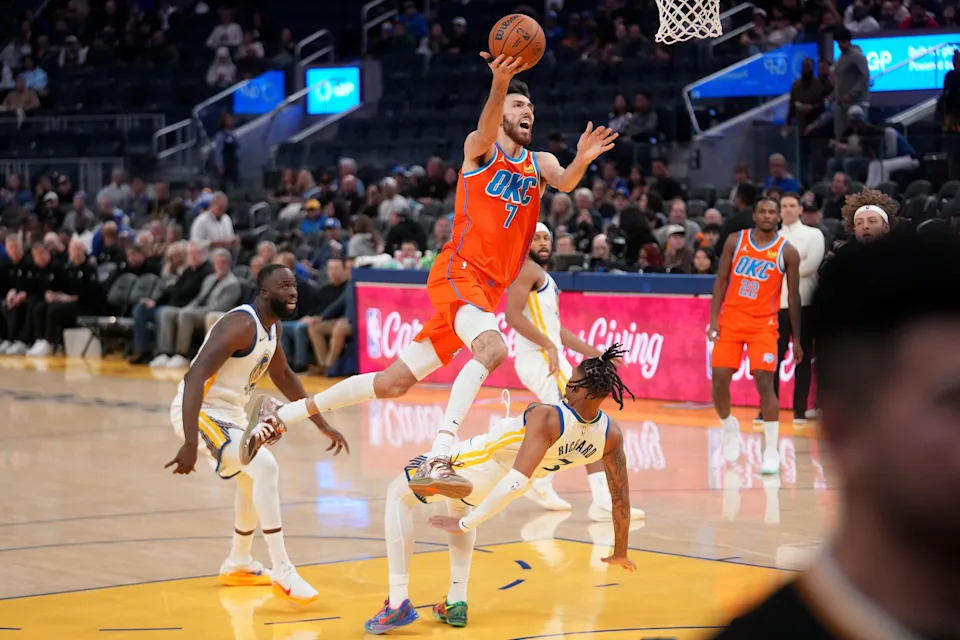 Dec 2, 2025; San Francisco, California, USA; Oklahoma City Thunder center Chet Holmgren (7) is called for an offensive foul after running into Golden State Warriors guard Will Richard (3) in the third quarter at the Chase Center. Mandatory Credit: Cary Edmondson-Imagn Images