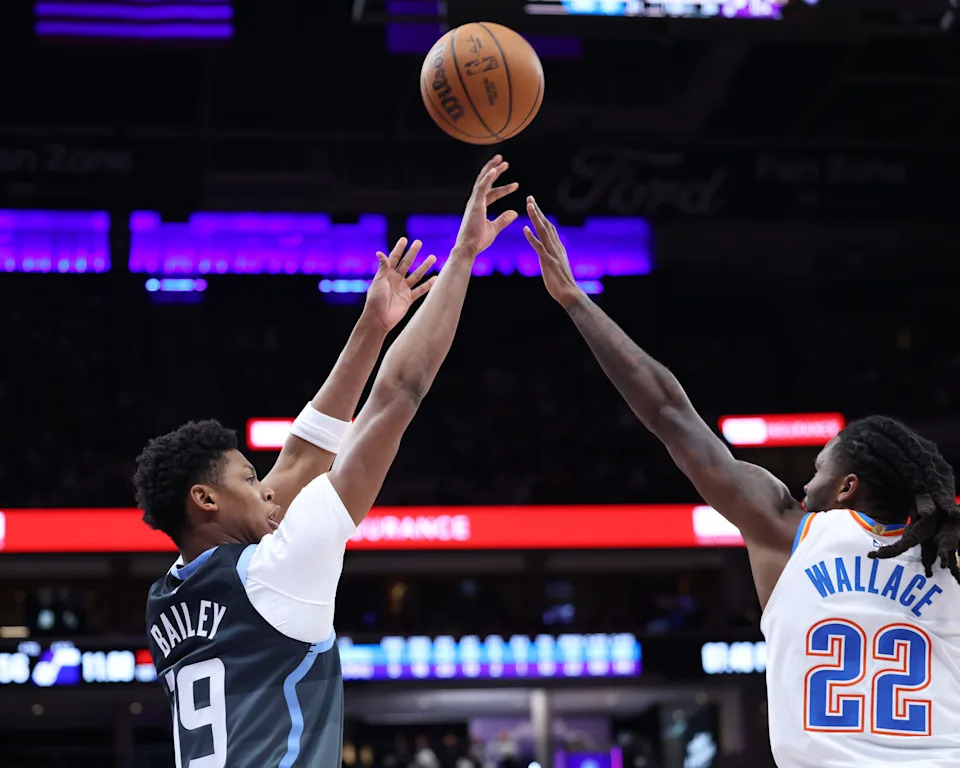 Dec 7, 2025; Salt Lake City, Utah, USA; Utah Jazz guard Ace Bailey (19) shoots over Oklahoma City Thunder guard Cason Wallace (22) during the second half at Delta Center. Mandatory Credit: Rob Gray-Imagn Images