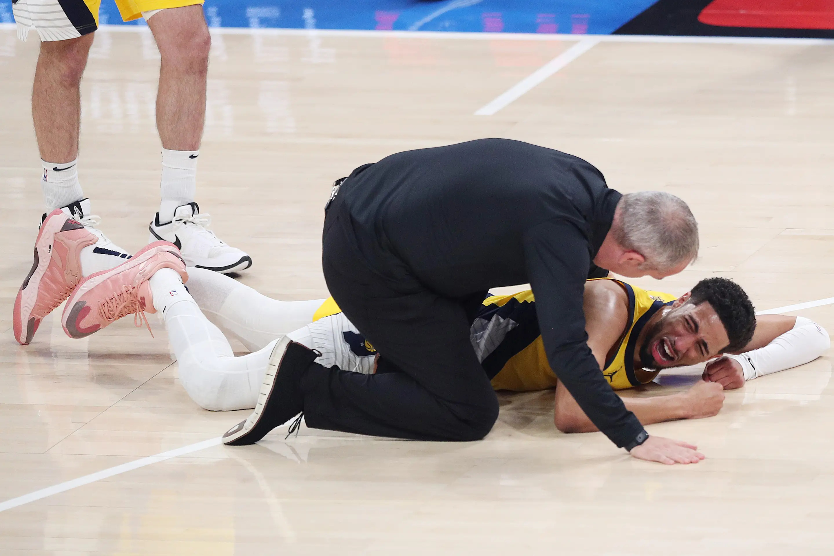 OKLAHOMA CITY, OKLAHOMA - JUNE 22: Tyrese Haliburton #0 of the Indiana Pacers sustains an injury during the first quarter against the Oklahoma City Thunder in Game Seven of the 2025 NBA Finals at Paycom Center on June 22, 2025 in Oklahoma City, Oklahoma. NOTE TO USER: User expressly acknowledges and agrees that, by downloading and or using this photograph, User is consenting to the terms and conditions of the Getty Images License Agreement. (Photo by Justin Ford/Getty Images)