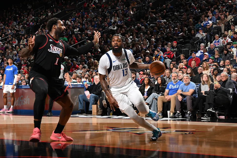 PHILADELPHIA, PA – DECEMBER 20: Naji Marshall #13 of the Dallas Mavericks drives to the basket during the game against the Philadelphia 76ers on December 20, 2025 at the Xfinity Mobile Arena in Philadelphia, Pennsylvania NOTE TO USER: User expressly acknowledges and agrees that, by downloading and/or using this Photograph, user is consenting to the terms and conditions of the Getty Images License Agreement. Mandatory Copyright Notice: Copyright 2025 NBAE (Photo by David Dow/NBAE via Getty Images)