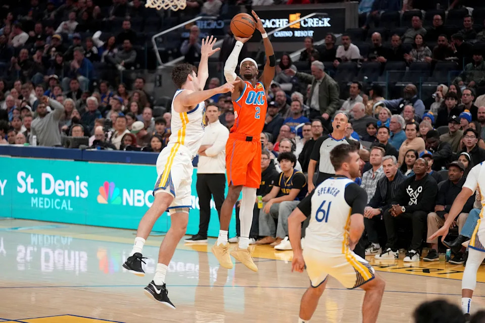 Dec 2, 2025; San Francisco, California, USA; Oklahoma City Thunder guard Shai Gilgeous-Alexander (2) shoots over Golden State Warriors center Quinten Post (21) in the third quarter at the Chase Center. Mandatory Credit: Cary Edmondson-Imagn Images