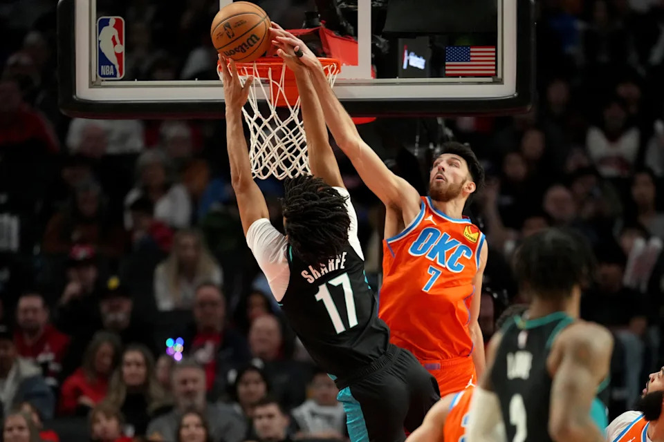 PORTLAND, OREGON - NOVEMBER 30: Chet Holmgren #7 of the Oklahoma City Thunder blocks the shot of Shaedon Sharpe #17 of the Portland Trail Blazers during the second half at Moda Center on November 30, 2025 in Portland, Oregon. NOTE TO USER: User expressly acknowledges and agrees that, by downloading and or using this photograph, User is consenting to the terms and conditions of the Getty Images License Agreement. (Photo by Soobum Im/Getty Images)