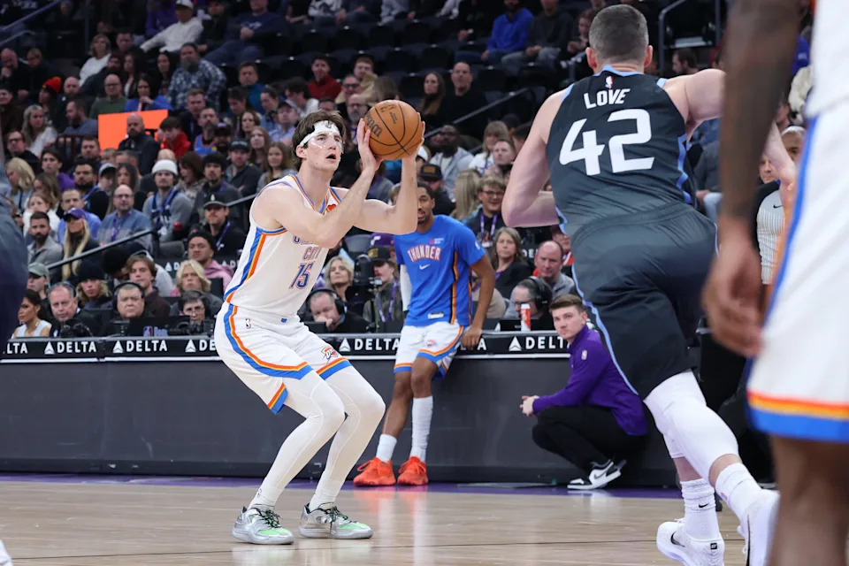 Dec 7, 2025; Salt Lake City, Utah, USA; Oklahoma City Thunder center Branden Carlson (15) prepares to shoot a three-point basket against the Utah Jazz during the first half at Delta Center. Mandatory Credit: Rob Gray-Imagn Images