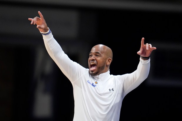 FILE - Seton Hall head coach Shaheen Holloway directs his team during the first half of an NCAA college basketball game against Indiana State for the championship of the NIT, Thursday, April 4, 2024, in Indianapolis. (AP Photo/Michael Conroy, File)