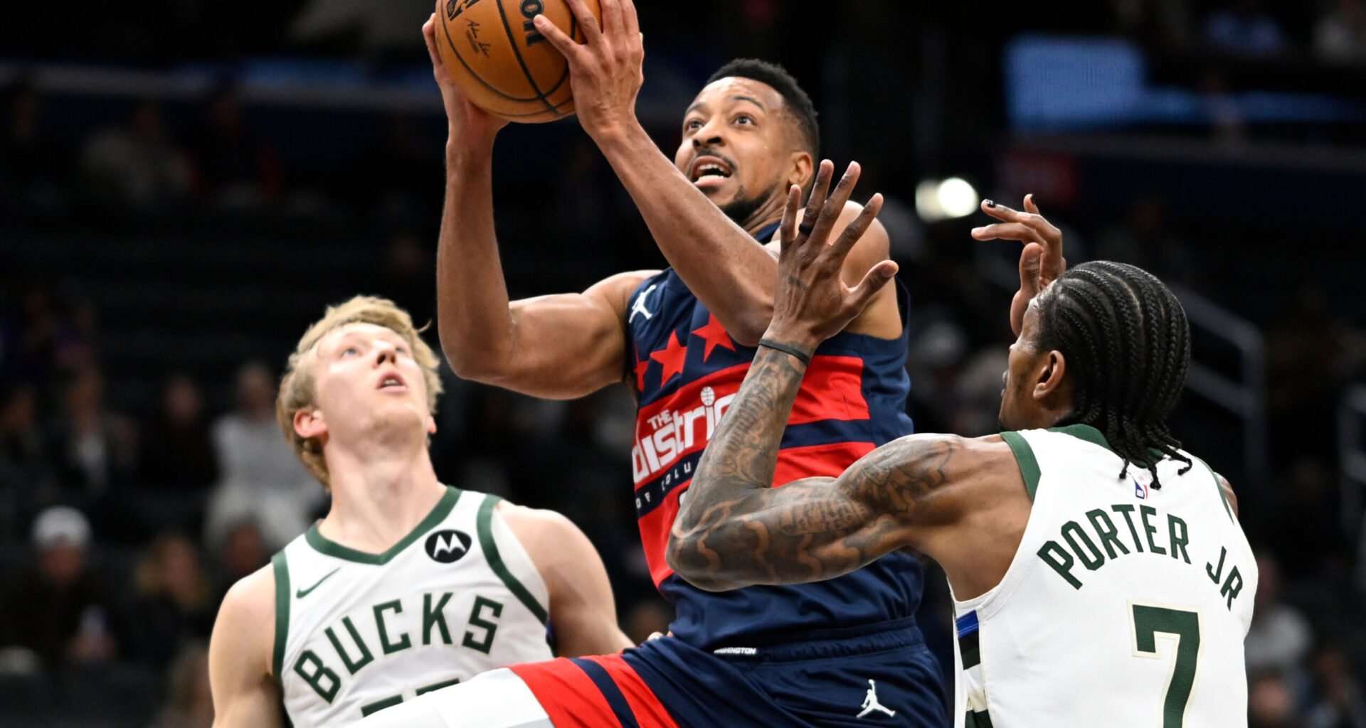 McCollum and Middleton lead the Wizards to a 129-126 win over Milwaukee despite Porter’s 30 points